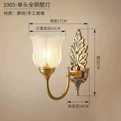 Antique brass leaf tulip wall lamp with a vintage-style brass wall lamp and textured glass shade for bedroom decor