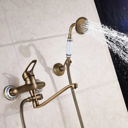 Antique brass long nose shower faucet with ceramic handle and decorative porcelain accents for bathroom decorbites brass long