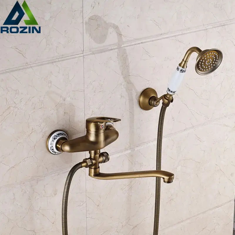 Antique brass long nose shower faucet with ceramic handles and matching handheld showerhead for bathroom decorbites brass long