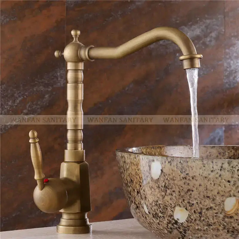 Antique brass ornate decorbites basin sink faucet with single handle curved spout and decorative knob for bathroom use