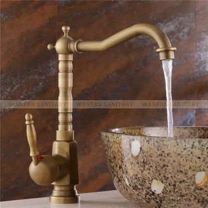 Antique brass ornate decorbites basin sink faucet with single handle curved spout and decorative knob for bathroom use
