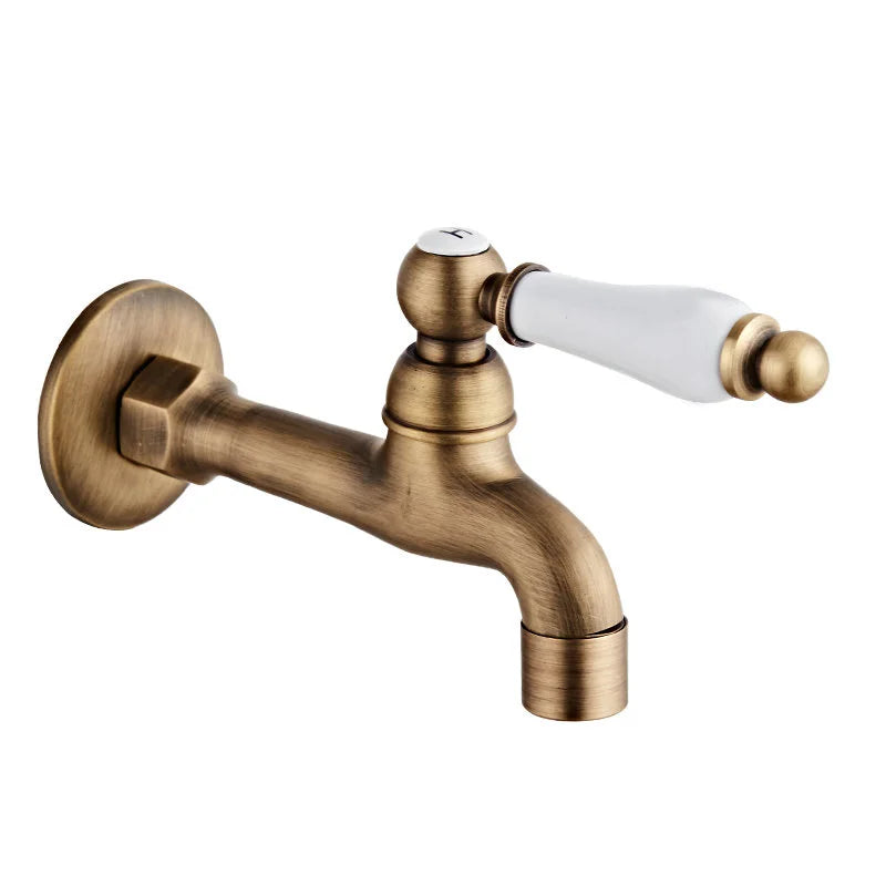 Antique brass outdoor faucet with single hole design, white ceramic handle, and durable brass housing material for garden use