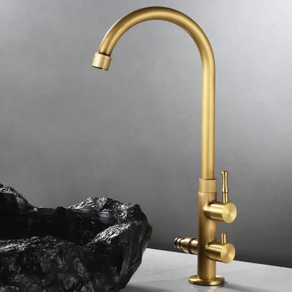 Antique brass outdoor faucet with dual control knobs and sleek curved spout in decorbites brass outdoor finish