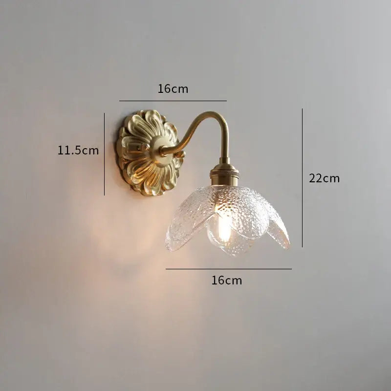 Antique brass wall lamp with pink rose frosted glass shade shaped like a flower by decorbites frosted glass