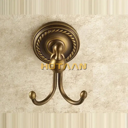 Antique brass rope wall hooks featuring double hook design with rope-twist detailing for bathroom decorbites brass wall use