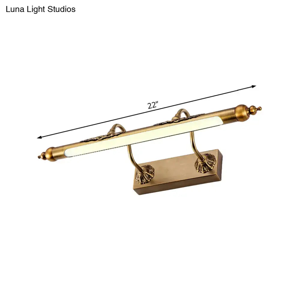 Antique brass shell vanity light with ornate mounts 22-inch length and 60w maximum bulb wattage for bathroom use