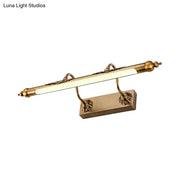 Antique brass shell vanity light with ornate detailing and maximum bulb wattage 60w wired electric fixture