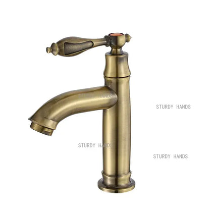 Antique brass single-handle bathroom faucet with classic ornate design and slightly curved spout for bathroom sink fixture