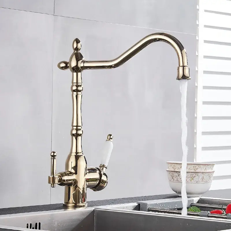 Antique brass vintage kitchen water filter faucet with dual spout curved design and white ceramic and metallic handles