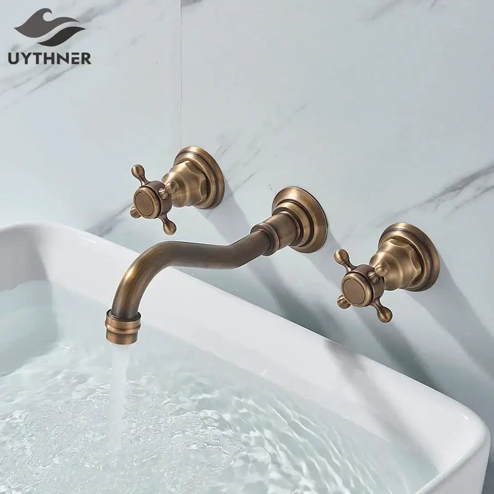 Antique brass wall mounted black basin faucet with two cross-handle knobs and curved spout for decorbites black basin faucet