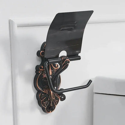 Antique bronze and black toilet paper holder with ornate bronze finish and sleek black plastic cover by decorbites black brass
