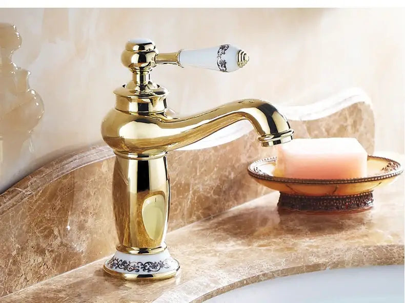 DecorBites™ antique bronze single handle bathroom faucet with gold finish white ceramic handle and matching floral base real shot details