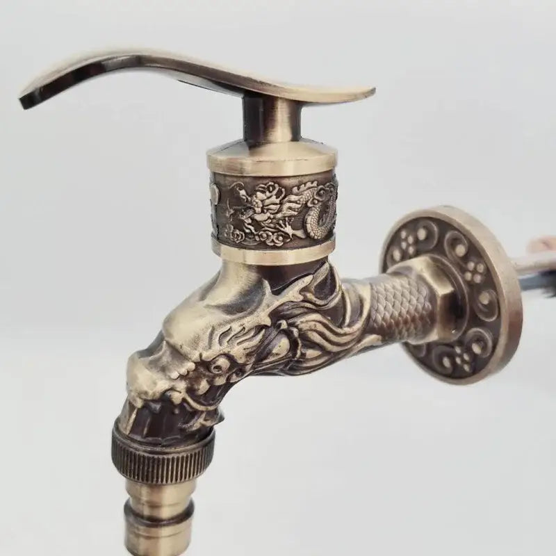 Antique bronze dragon tap bibcock with intricate floral embossing for outdoor garden decorbites bronze dragon faucet