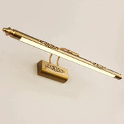 Antique bronze ornate led mirror lamp featuring brass finish and intricate scrollwork for bathroom wall decor