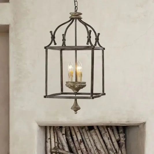 Antique dark bronze chandelier light with creative American iron frame and glowing candle bulbs for kitchen decorbites creative American iron