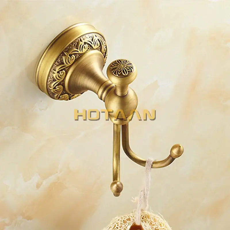 Antique floral brass double hook robe hook with ornate detailing and antique finish for bathroom decorbites brass robe