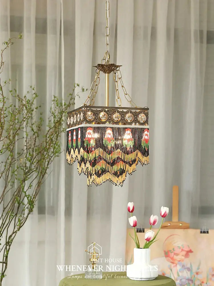 Antique french brass crystal chandelier with intricate gold black and pink beaded fringe decorbites french brass tassel light