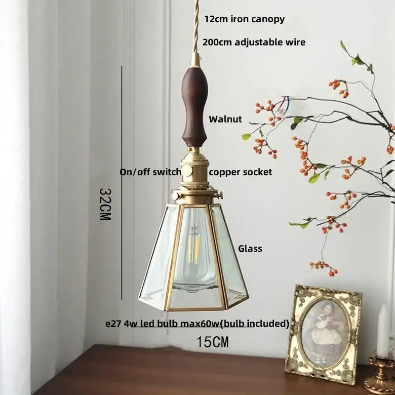 Antique gold petal glass led pendant lamp with dark walnut handle brass accents and clear glass panels for kitchen lighting