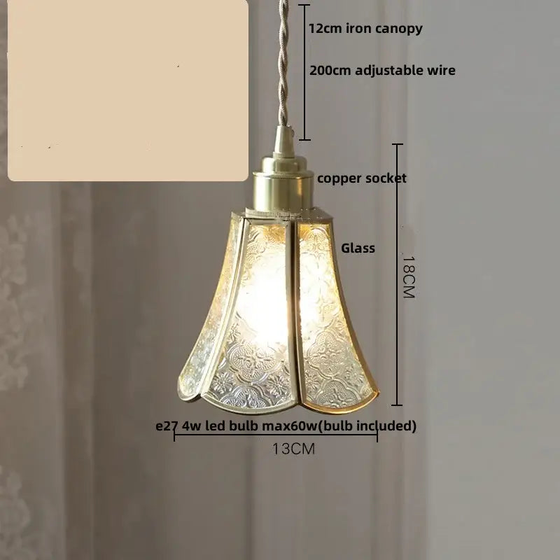 Antique gold pendant lamp with brass finish, etched petal glass led shades, and twisted iron canopy for kitchen lighting