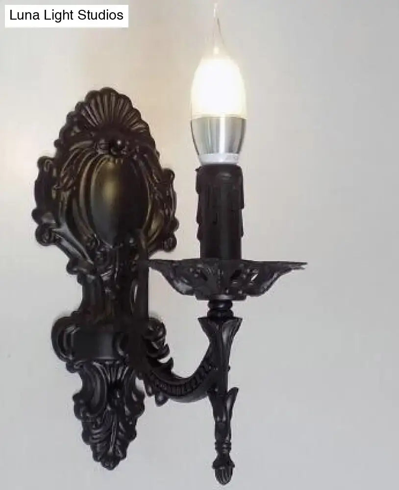 Black ornate wrought iron wall sconce with single candle bulb for creative retro european wall bedroom light