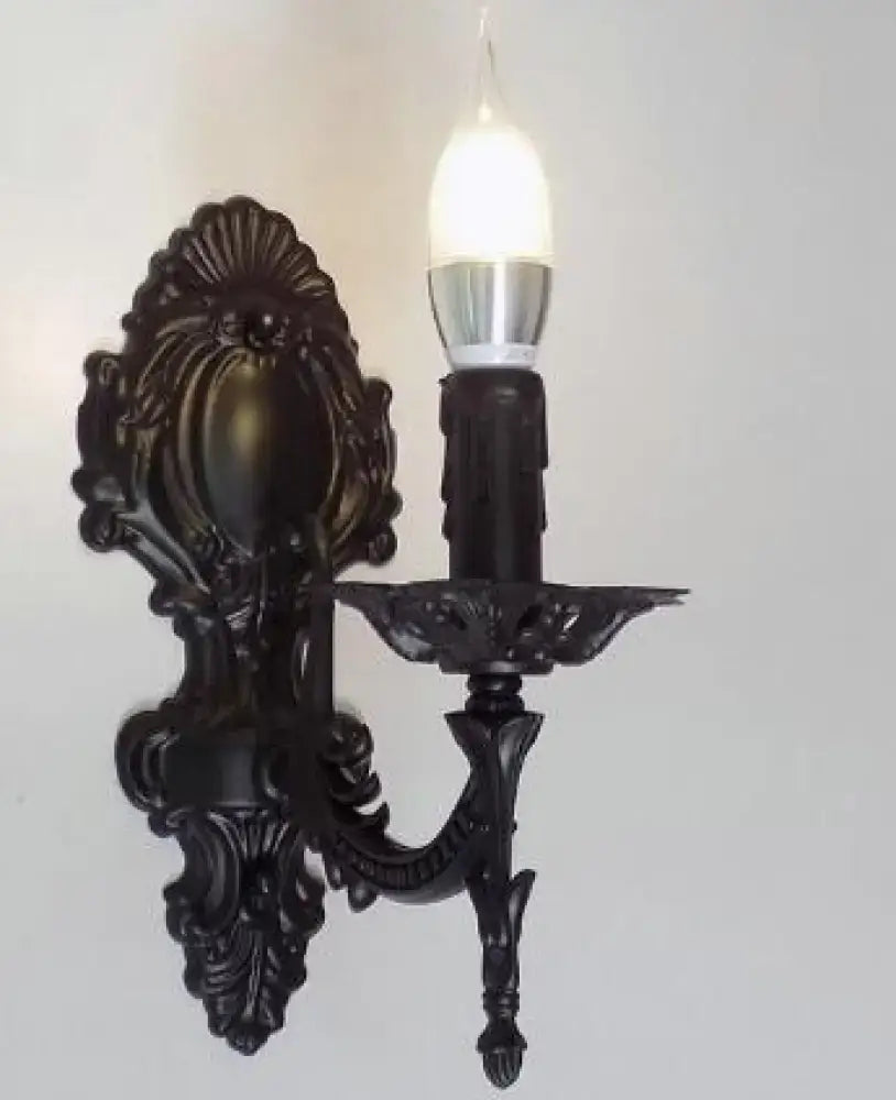 Black ornate wrought iron creative retro european wall sconce with candle-style bulb for elegant bedroom lighting
