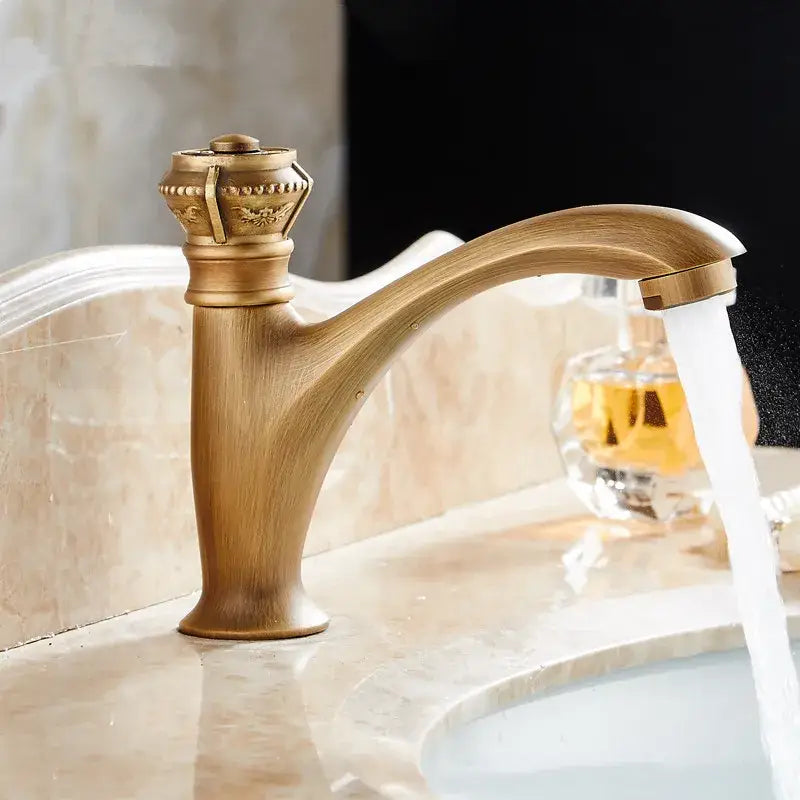 Antique ornate brushed bronze basin faucet with crown-like handle and curved spout for bathroom decorbites brushed bronze