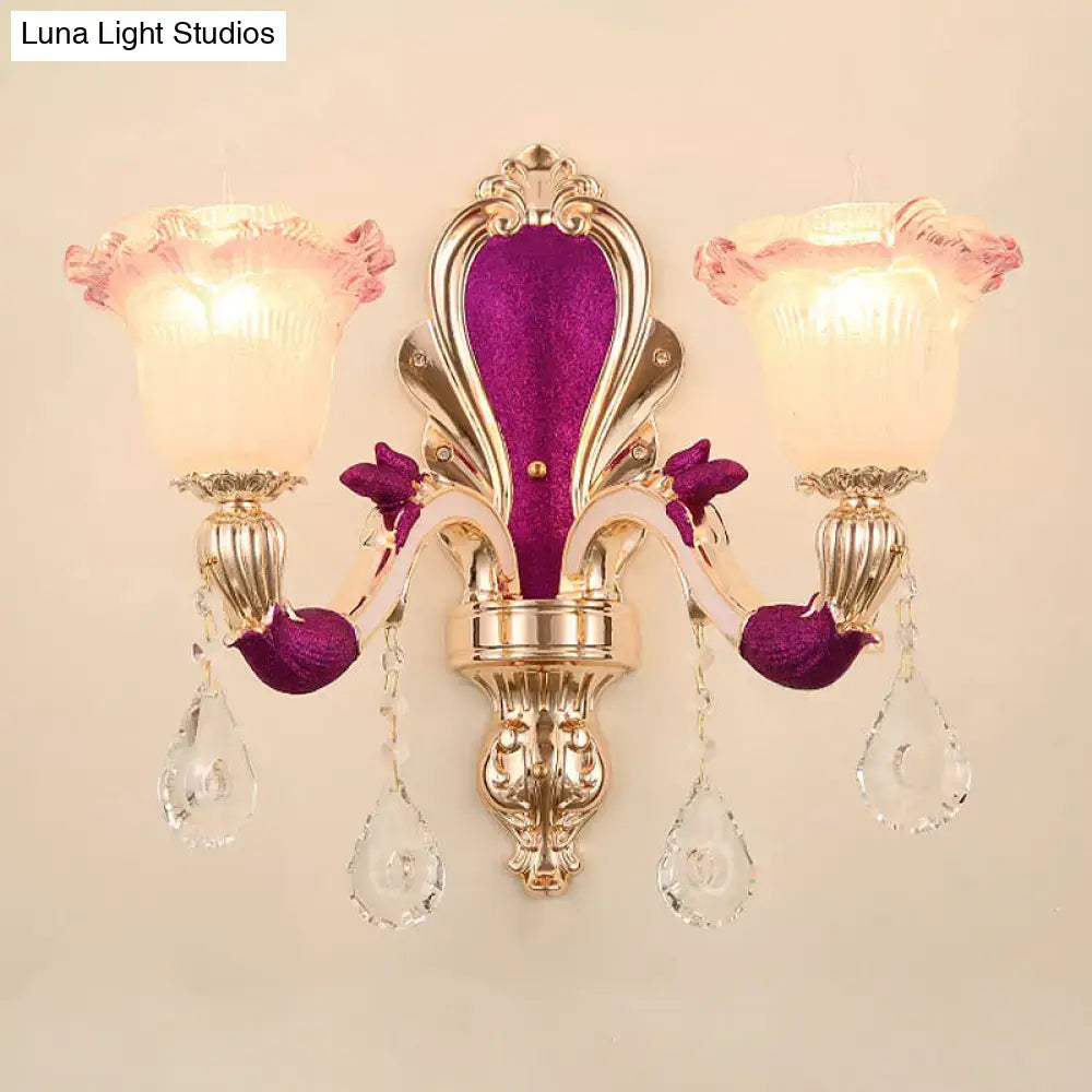 Antique purple and gold double head mount light fixture with pink glass shades and crystal pendants for bedroom sconce