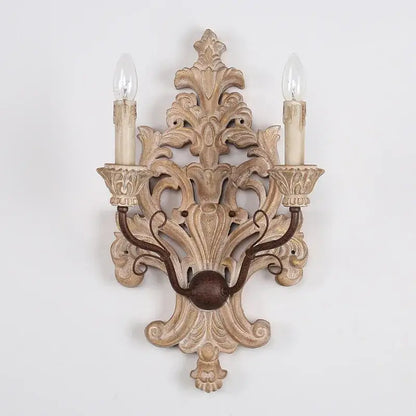 Antique solid wood wall lamp with two-light ornate distressed beige wood and dark metal accents for elegant decorbites decor