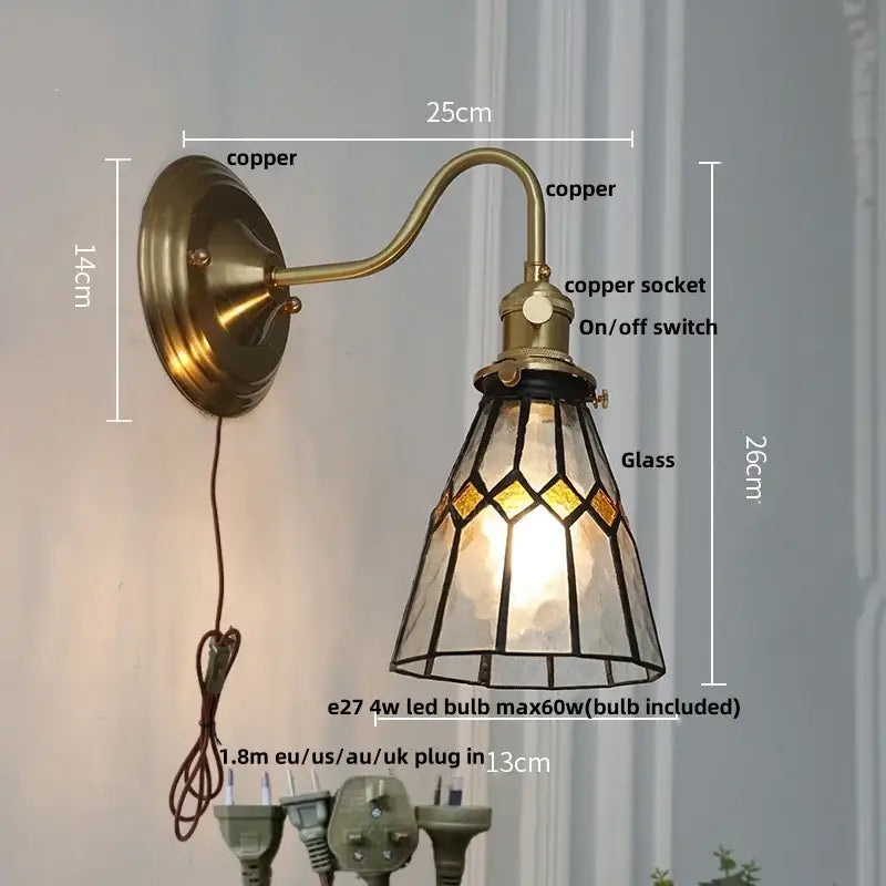 Antique teal glass and brass wall light fixture with copper sconce and stained glass shade in amber and clear geometric patterns