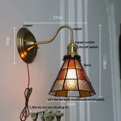 Antique teal glass and brass wall light fixture with copper sconce and amber stained glass shade for bedroom use