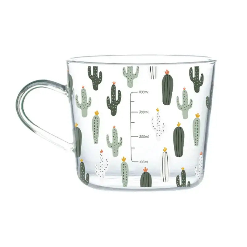 Clear glass 500ml glass mug with handle featuring apricot and orange pattern and green and white cacti design