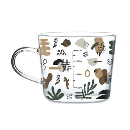Clear glass 500ml glass mug with handle featuring apricot and orange earthy abstract design for kitchen breakfast