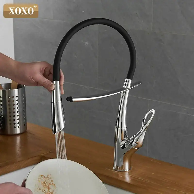 Arched brushed nickel kitchen faucet by Xoxo with sleek chrome finish black flexible hose and elegant curved spout design