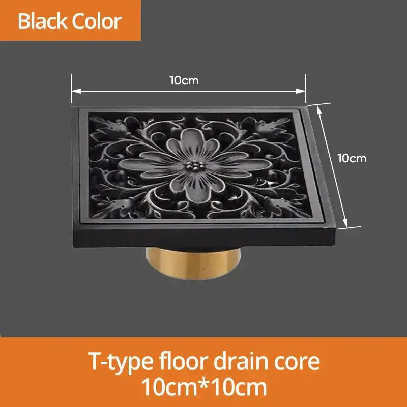 Black brass shower drain cover with ornate floral design and brass-colored base 10cm x 10cm decorbites black brass