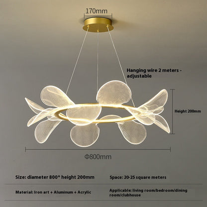 Modern white flower-shaped acrylic pendant chandelier with gold accents and adjustable hanging wire for bedroom use