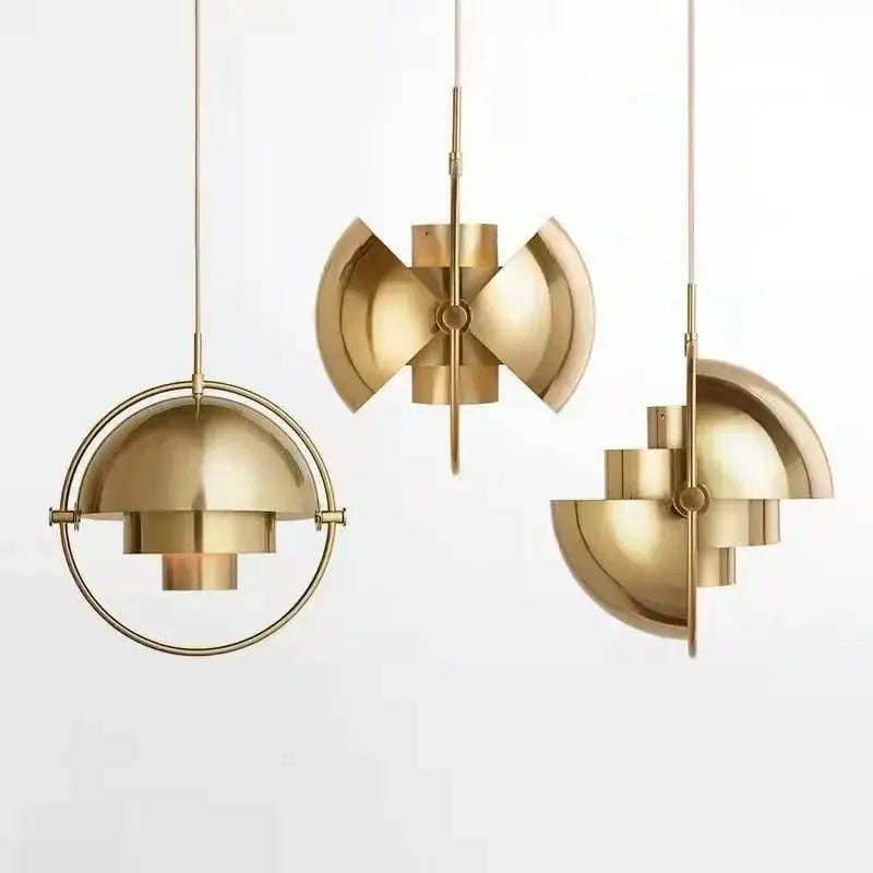 Three elegant art deco brass pendant lights with flower-like bulb base designs for dining room illumination