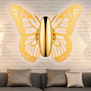 Gold butterfly wall sconce metal lamp with intricate cutout wings and sleek body for kids room decor