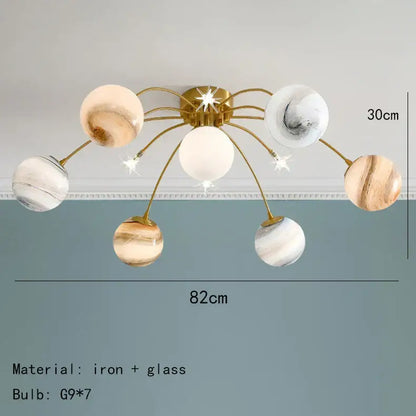 Gold-toned iron planet ball pendant lamp with six glass globes for dining room decorbites art deco lighting fixture