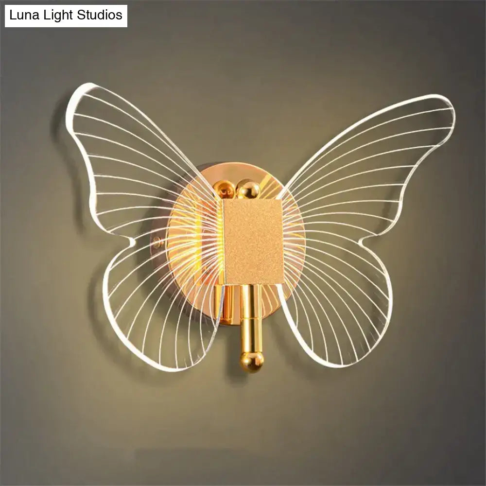 Art deco gold swan wall lamp with butterfly-shaped gold-toned sconce and translucent wings for bedroom bedside wall use