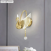 Art deco gold swan wall lamp with translucent mesh wing and crystal orb for bedroom bedside wall lighting