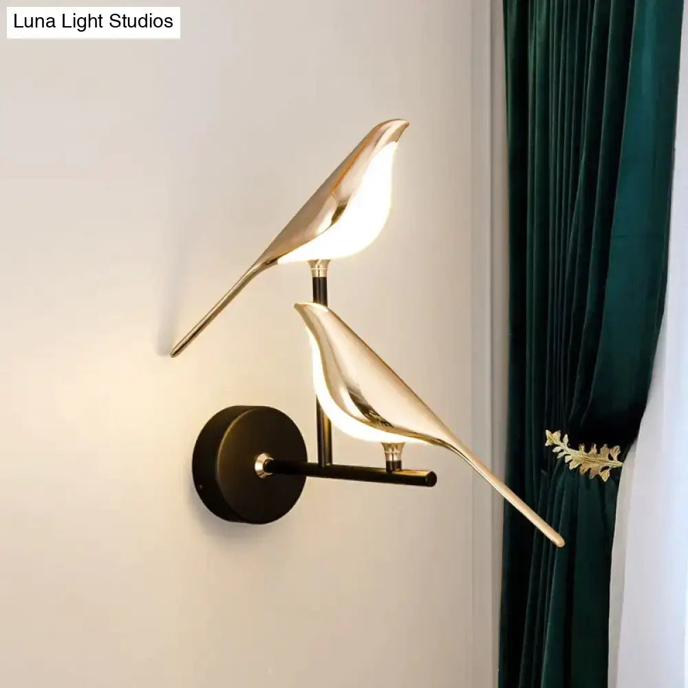 Art deco gold swan wall lamp with crystal featuring gold-toned bird design and dark bronze base for bedroom bedside wall use