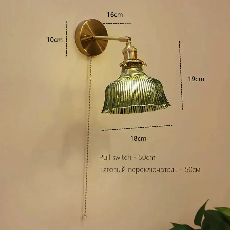 Vintage-style brass art deco led wall lamp with green ribbed glass shade and adjustable pull chain switch by decorbites