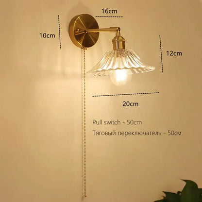 Vintage-style brass Art Deco led wall lamp with fluted glass shade and exposed bulb for decorbites art deco decor
