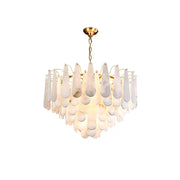 A decorbites art deco marble tiered led chandelier with cascading white translucent teardrop shades on gold frame for dining room decor