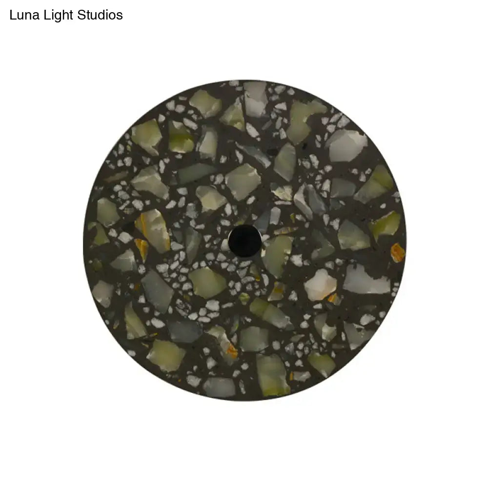 Circular dark green terrazzo wall sconce with light green white and orange fragments for living room led wall light