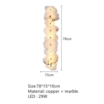 Art deco off white marble led wall sconce with layered organic shapes and copper accents for elegant marble lighting decorbites