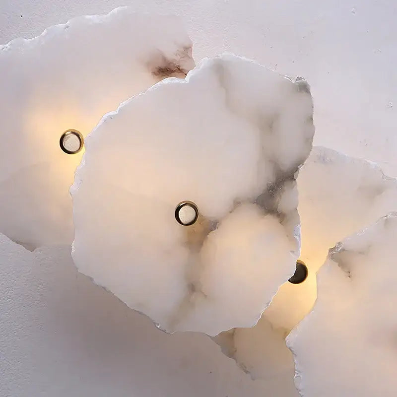 Art deco off white marble wall sconce with gold-toned circular fixtures elegant marble led decorbites elegant marble