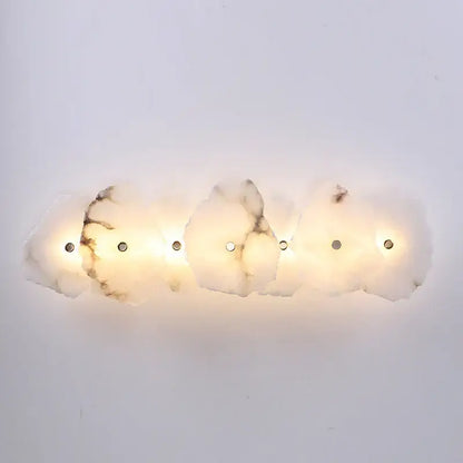 A modern four-light wall sconce with elegant marble led cloud-like off white shades for bedroom decorbites elegant marble decor