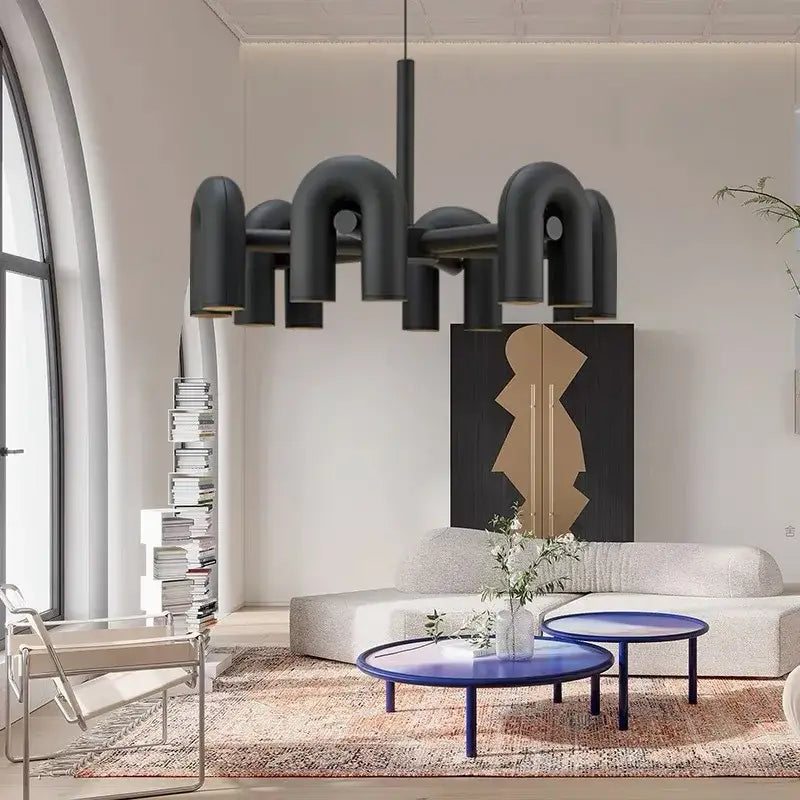 Black industrial-style art deco metal chandelier with curved pipe-like arms for dining room decorbites art deco lighting