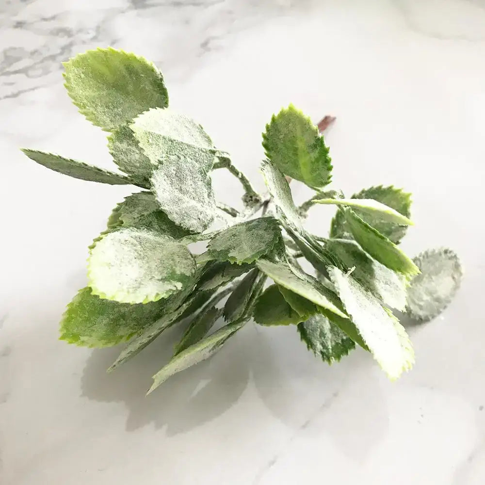 Frosted green artificial foliage with delicate leaf shapes in a decorbites green plant flower cherry berries bundle for living room decor